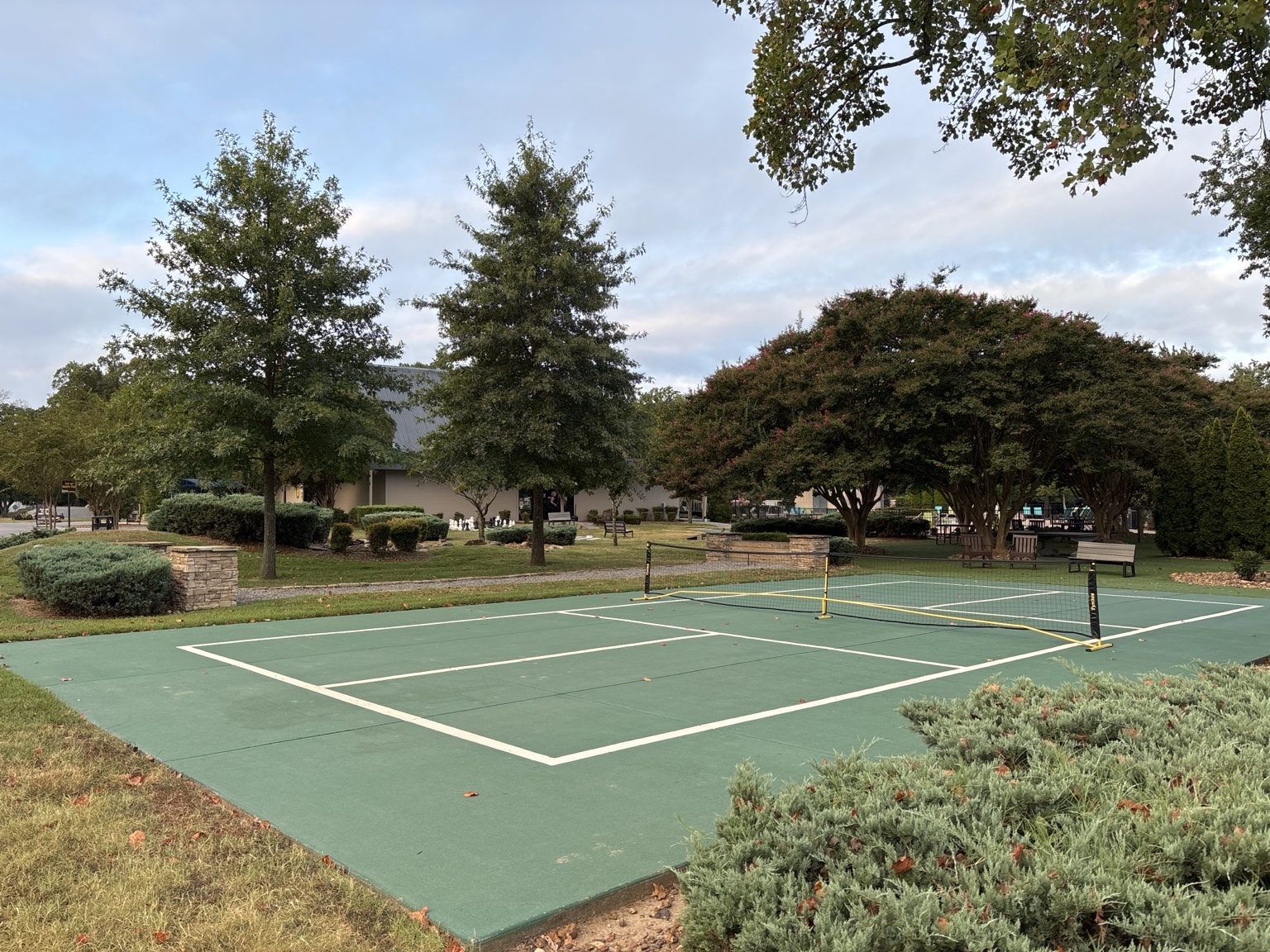 Outdoor recreation court with a low net on the Nashville KOA Resort grounds
