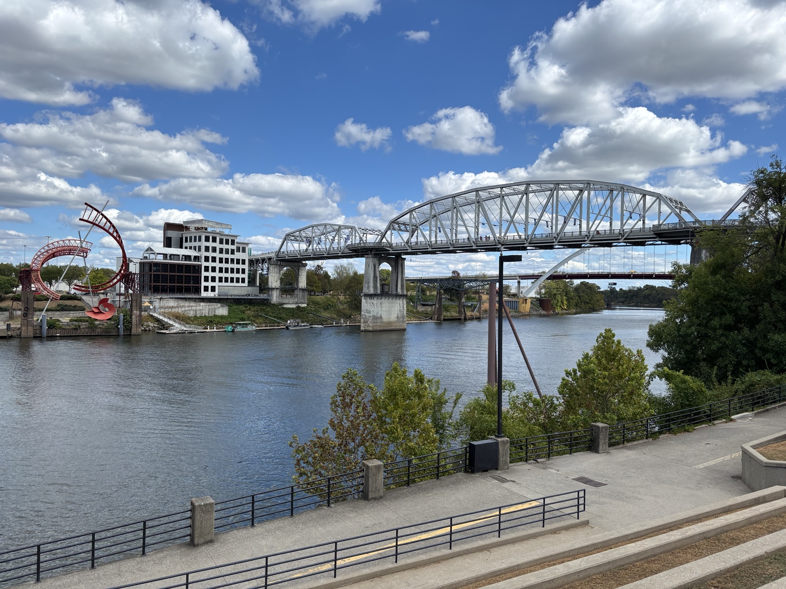Nashville riverfront and pedestrian bridge on a clear day